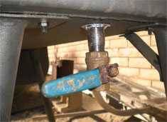 installation of a ball valve to easily drain grease