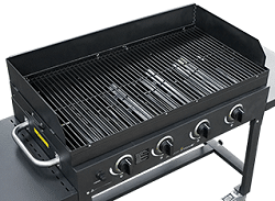 Black boxt gas grill from above. There is no lid and we see the rectangular cooking grate with four burners below.