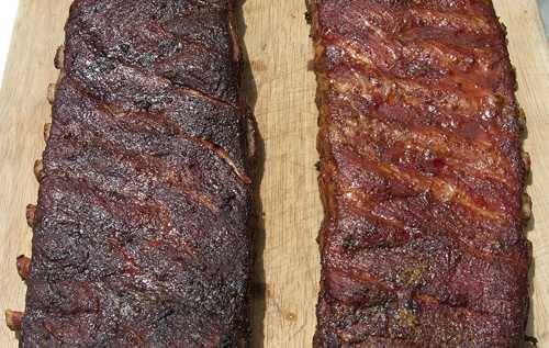 Strip of meat that has been smoked and turned dark, similar strip of meat without smoke that remains a deep red.