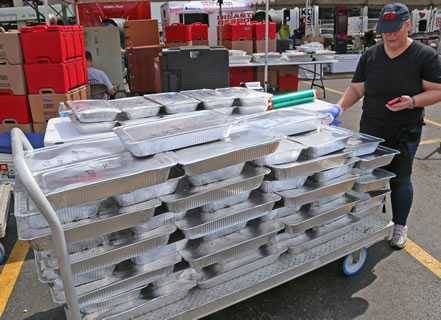 Trays of food from Operation BBQ Relief shipping to distribution centers