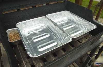 water pans on a gas grill with 2-zone heat setup