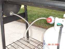connecting the hose to the propane tank